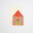 Card with a house design on a white background