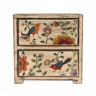 Small wooden box with hand-painted birds and flowers on a white background