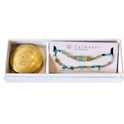 Gemstone and gold beaded bracelet and gold travel tin in white presentation box