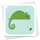 Greetings card featuring a green chameleon with a googly eye, catching an amusing fly with his long pink tongue. Illustration has blue background and a white border. Shown with an envelope. 