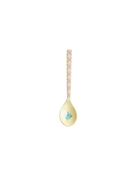 Decorative spoon with a floral design on a white background