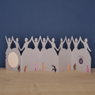 Card with cut-out figures holding hands against a blue background