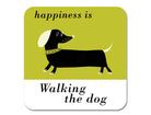 Coaster with text  'happiness is walking the dog' with a dachshund illustration on a green and white background