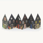 Greetings card of decorative paper houses with various designs on a white background