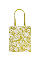 Tote bag with white floral pattern on a white background