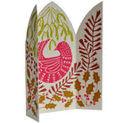 Decorative card with a bird design and holly leaves on a white background