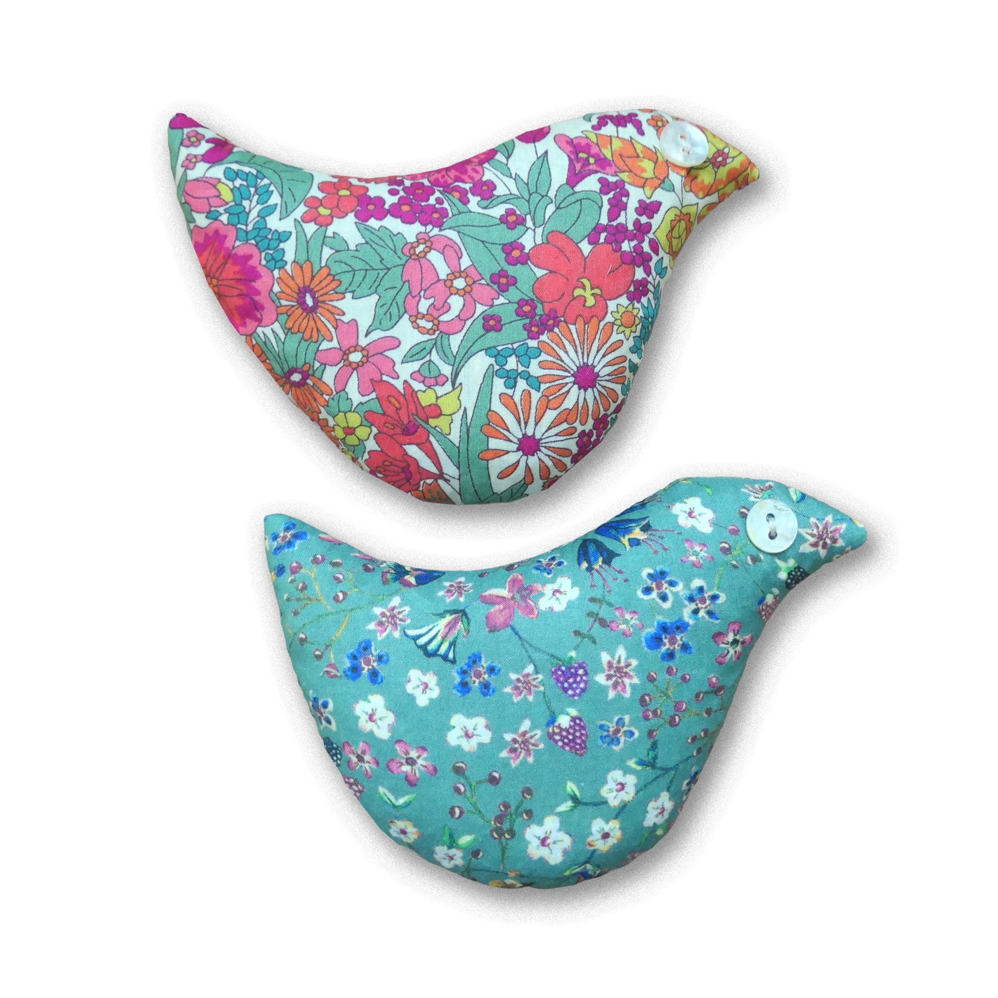 Two floral-patterned lavender bird shaped sachets on a white background