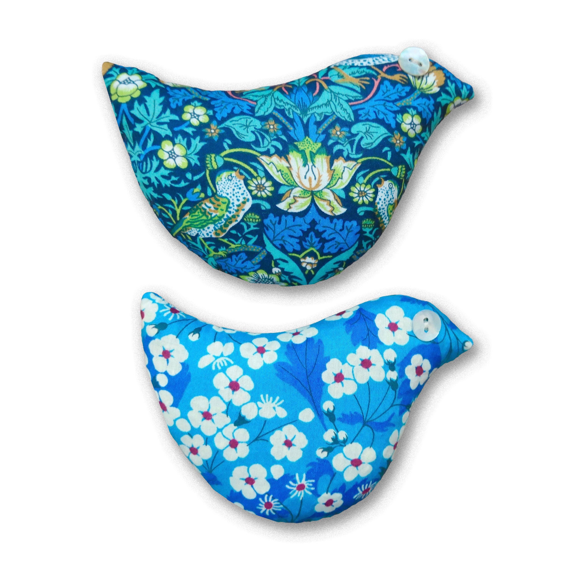 Two blue floral-patterned sachets on a white background