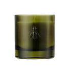 Green glass candle with a bee emblem on a white background