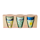 Three colorful ceramic cups in a wooden box with 'rice' branding.