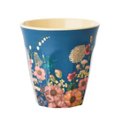 Blue cup with floral design on a white background