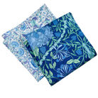 Two floral-patterned fabric hankies on a white background