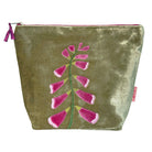 Velvet pouch with pink floral embroidery on a white background