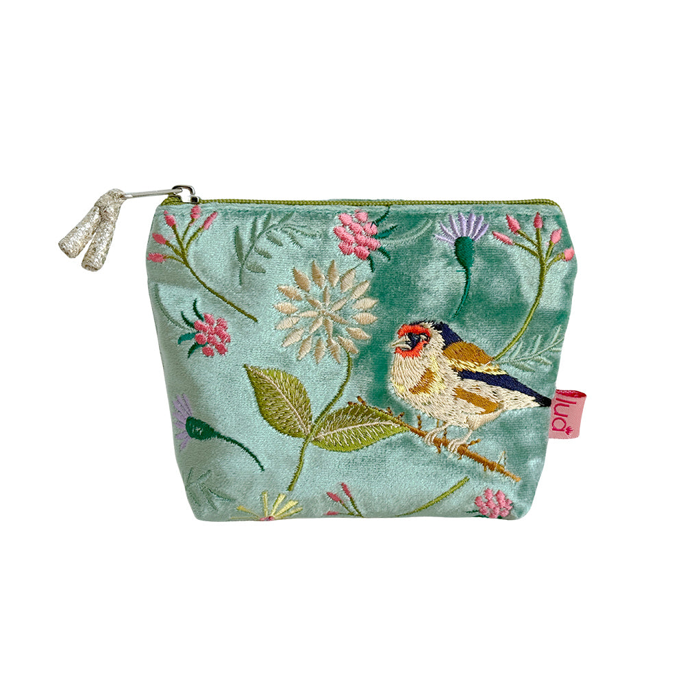Embroidered pouch with bird and floral design on a light blue background