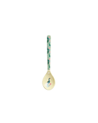 Decorative spoon with peacock design on a white background