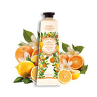 Hand cream with orange and lemon design on a white background