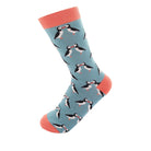 Sock with puffin pattern on a light blue background
