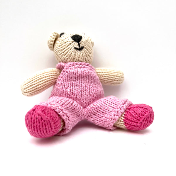 knitted soft toy polar bear in Pink dungarees