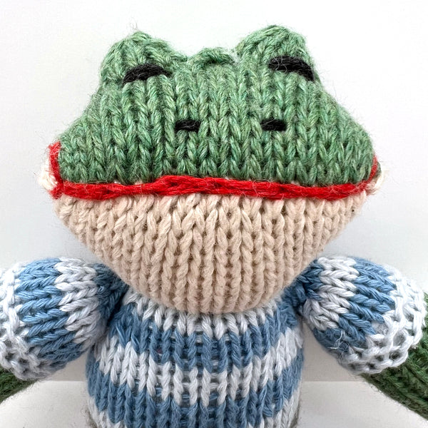 Green frog toy with blue stripe jumper hand knitted 