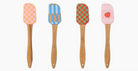 Four colorful spatulas with wooden handles on a white background