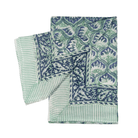 Set of green and blue patterned napkins on a white background