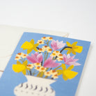 Card with a floral design on a blue background