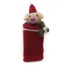 A handcrafted felt Christmas ornament depicting a pig wrapped in a red blanket, wearing a red Santa hat and holding a green holly sprig with white berries, set against a plain white background.