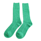 Pair of green socks on a white background