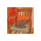 A square art print featuring a cozy illustration of a gray tabby cat curled up asleep on a teal cushion with an orange striped pillow, set against a warm-toned interior background with a red draped blanket.