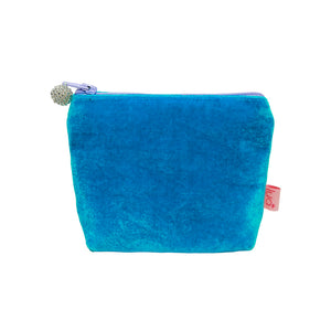 Bright blue small velvet pouch with lavender purple zip and white beaded zip pull.