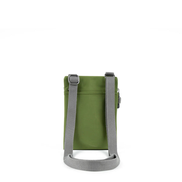 A photo of the back of a small rectangular avocado green pocket bag. It has a pocket and grey straps.