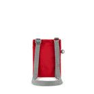 A photo of the back of a small rectangular red pocket bag. It has a pocket and grey straps.