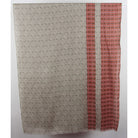 A rectangular textile panel or curtain hanging flat against a plain light background, featuring a repeating circular geometric pattern in warm gray and rust red.