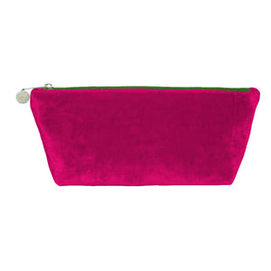 photo of a bright pink velvet pouch with green zip and beaded zip pull, against a white background