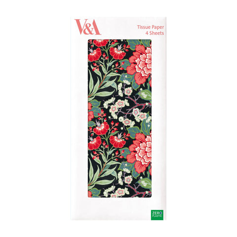 Pack of tissue paper with red floral and green leaf pattern against a black background