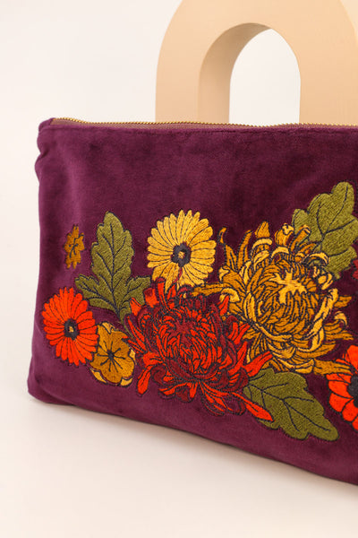 velvet hand bag embroidered detail 