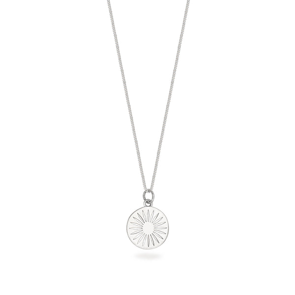 silver daisy necklace on white background 