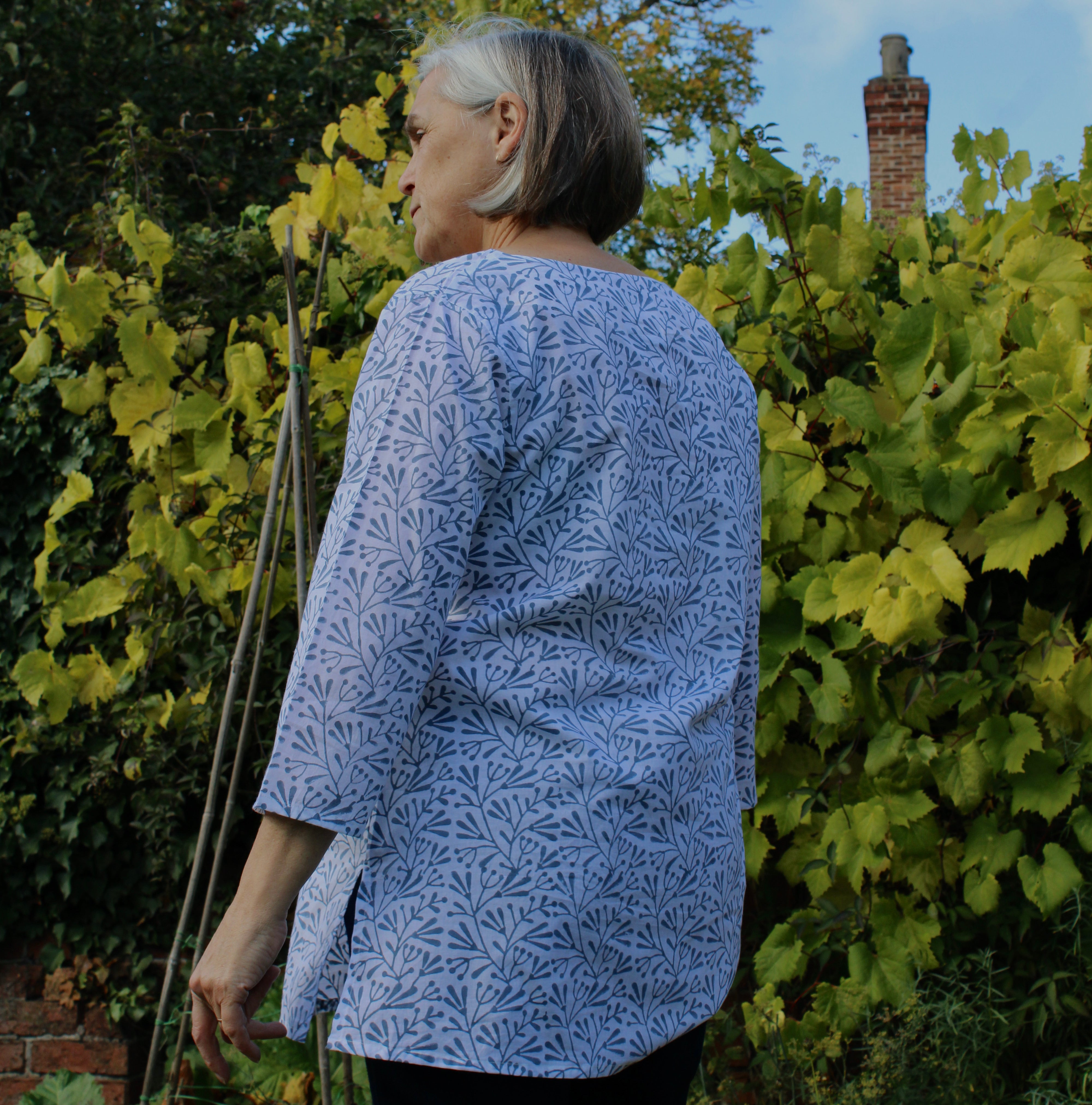 blue bud summer tunic top on model 