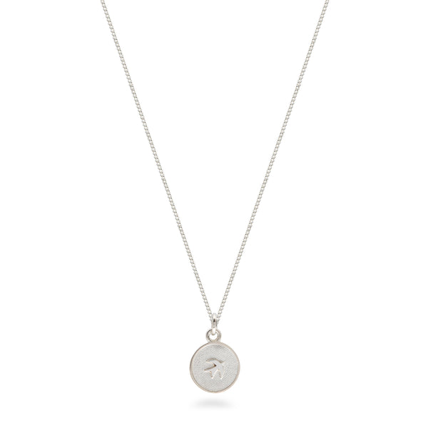 silver medallion swallow design 