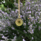 spinning wheel medallion in gold vermeil 