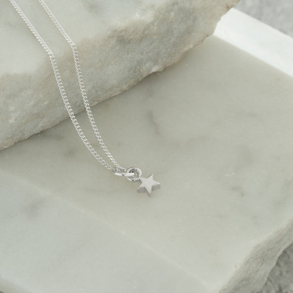 mini star necklace in sterling silver 