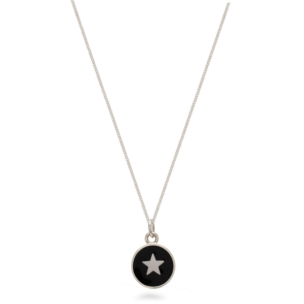 black star pendant on a sterling silver necklace 