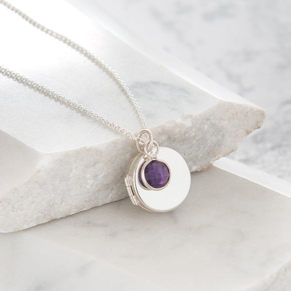 silver locket with birthstone amethyst February birthstone 