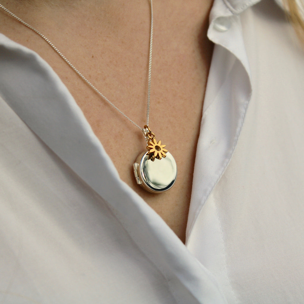 Round silver locket outlet