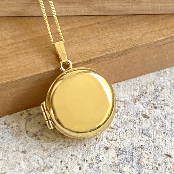 Round gold locket 